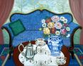 A blue damash sofa , love seat painted with a blue and whit vase filled with antique roses.