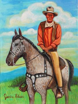 John Wayne is seated on a horse an appleloosa, dappled grey and white with a decorative saddle. John Wayne is wearing a coral peach colored shirt with vest and camel pants.